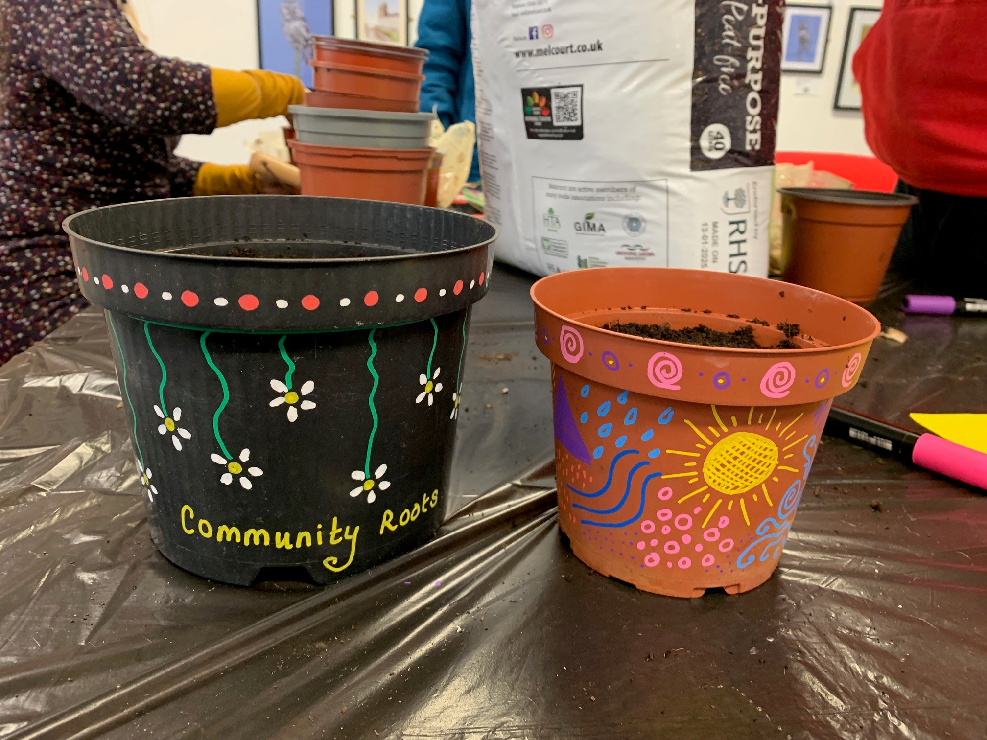 Photo of Community Roots plant pots.