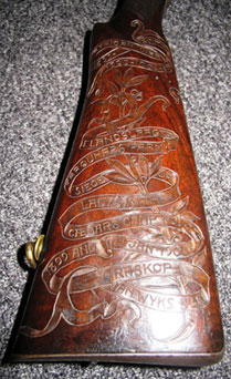 Engraving on butt of rifle