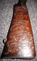 Engraving on butt of rifle