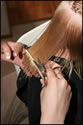 Picture of someone's hair being cut