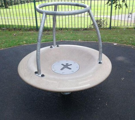 Inclusive spinning bowl with handle bars situated on wetpour