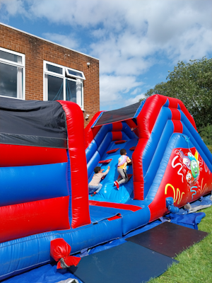 Children on a bouncy castle